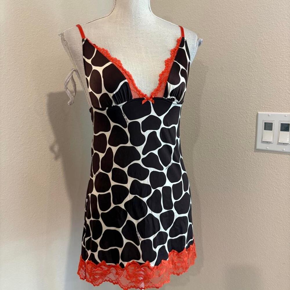 Victoria's Secret giraffe print nylon slip with orange lace trim. size small